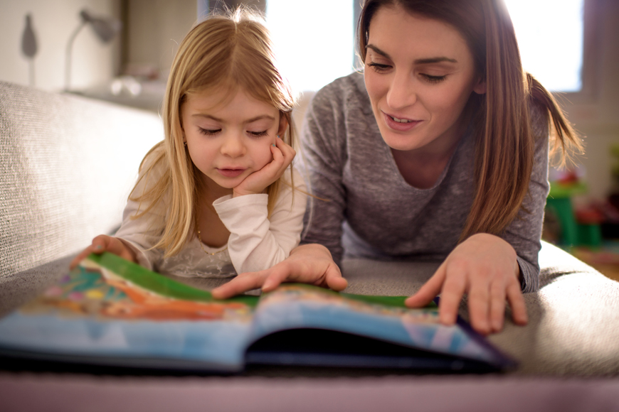 Mother and daughter reading 