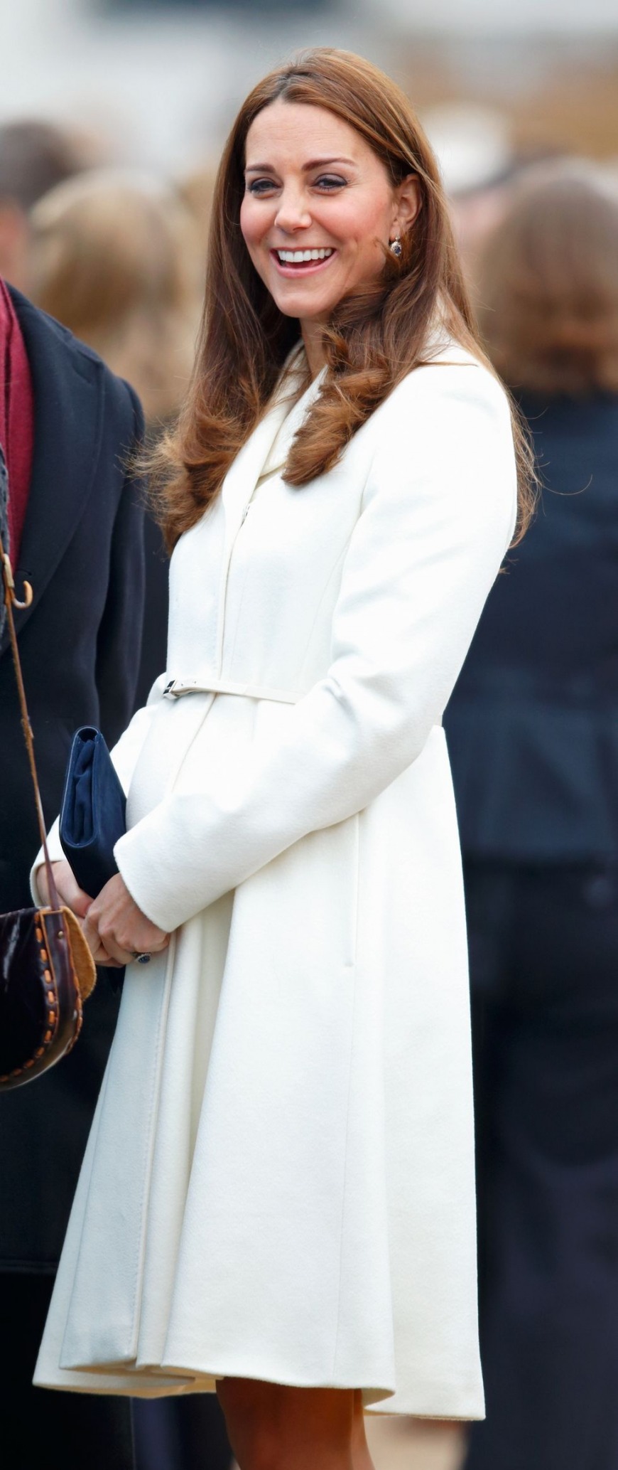 You can never go wrong with white. The Duchess paired this white coat with a blue bag for a visit to Portsmouth You can never go wrong with white. The Duchess paired this white coat with a blue bag for a visit to Portsmouth