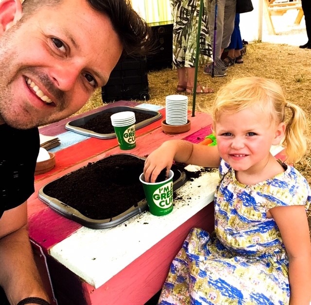 Lee encourages his daughter Olive to grow her own veg