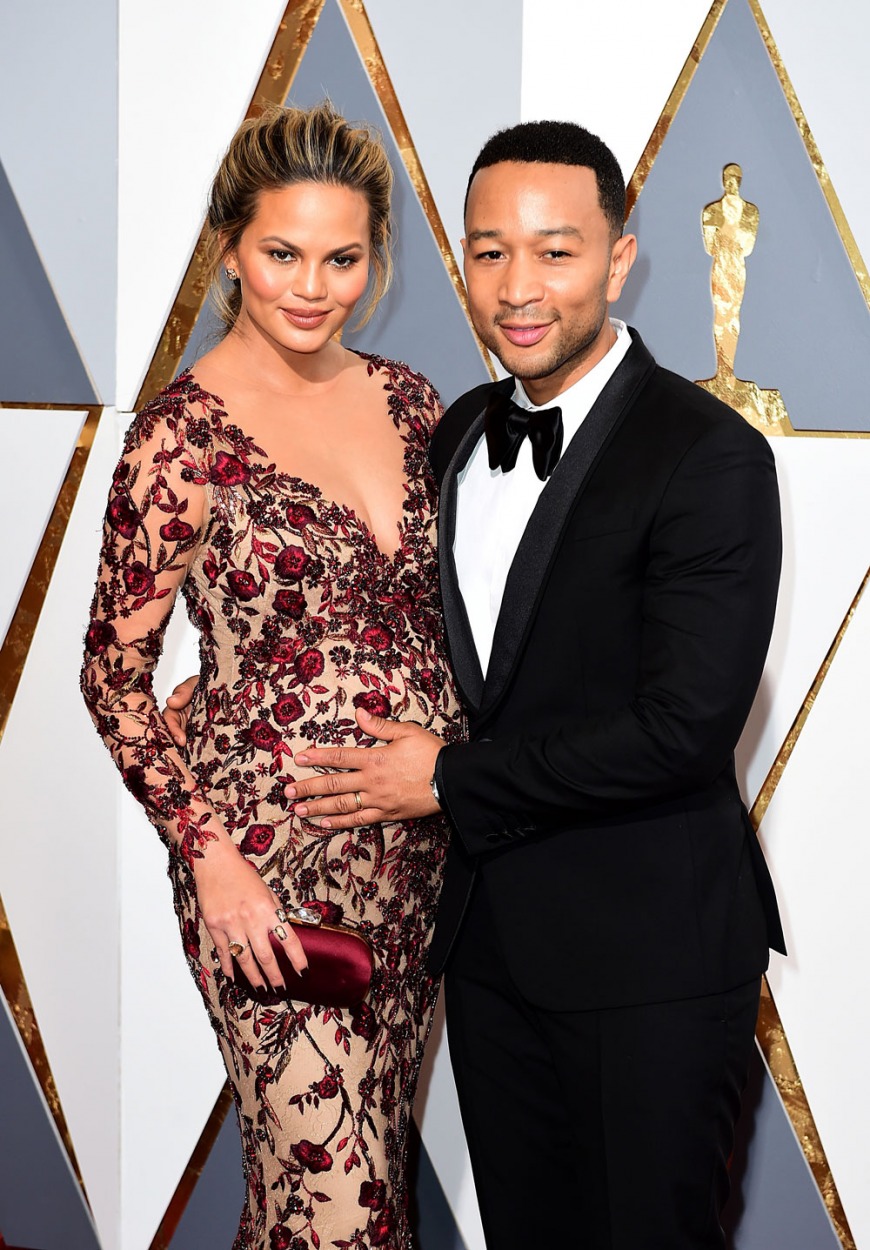 Chrissy Teigen and her husband John Legend when she was pregnant with her first child Luna