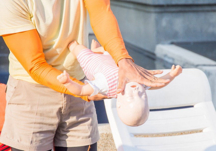 Giving CPR to a baby or toddler